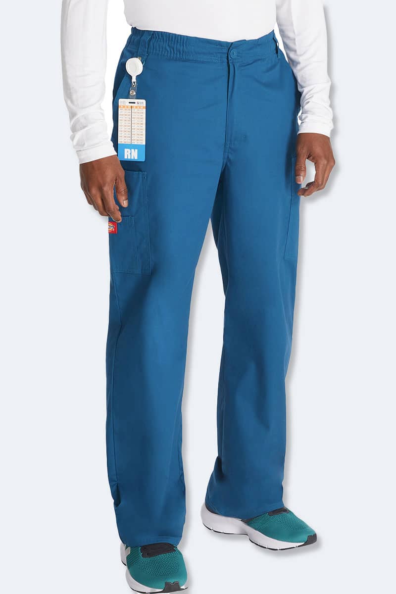 Male healthcare professional wearing Dickies 81006 EDS men's scrub pants in Caribbean blue, showcasing authentic and trusted quality medical scrubs for men in Australia.