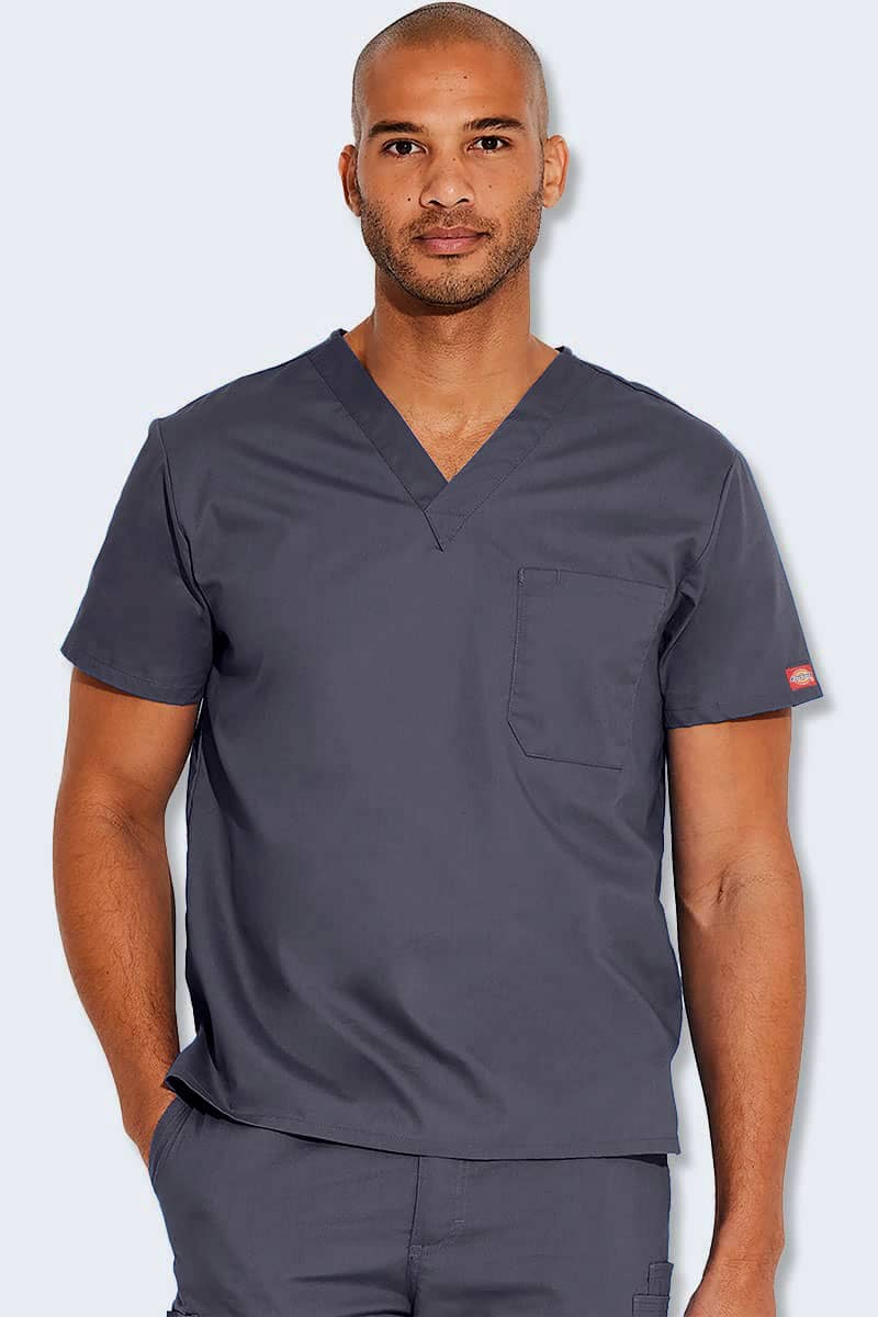 Male healthcare professional wearing Dickies 83706 EDS unisex scrub top in pewter grey, showcasing durable and reliable medical scrubs for healthcare workers in Australia.