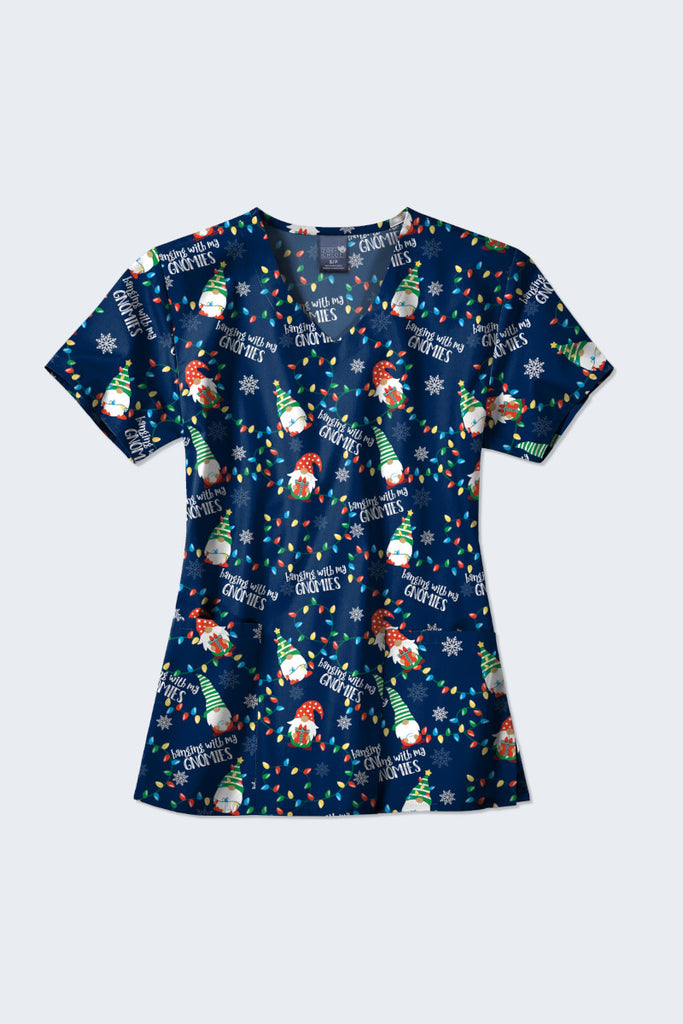 Festive Christmas scrub top featuring a 'Hanging with my Gnomies' print, available at Infectious Clothing Co. in Australia. Perfect for the holiday season, this top showcases playful gnomes, holiday lights, and snowflakes.