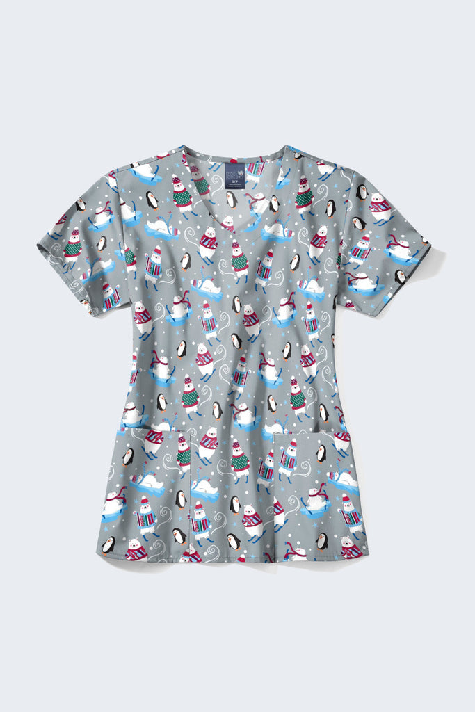 Winter-themed Christmas scrub top featuring playful snowmen and penguins on sleds, set against a light grey background, perfect for adding holiday spirit to your workwear. Available at Infectious Clothing Co. in Australia.