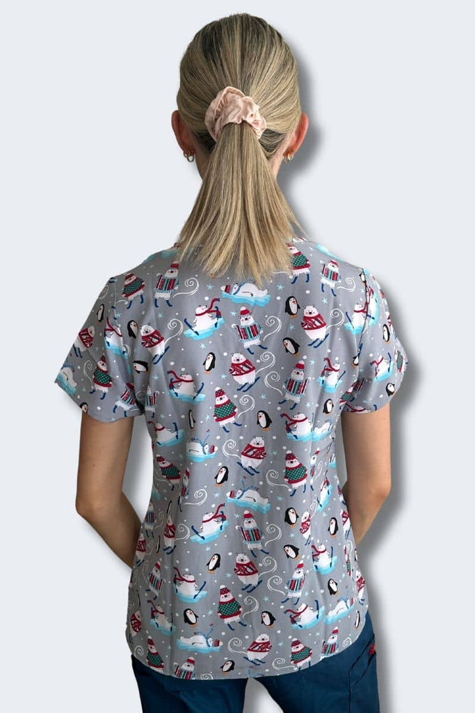 'Tis the Ski-son - Women's Christmas Scrub Top Model Back View | Infectious Clothing Company