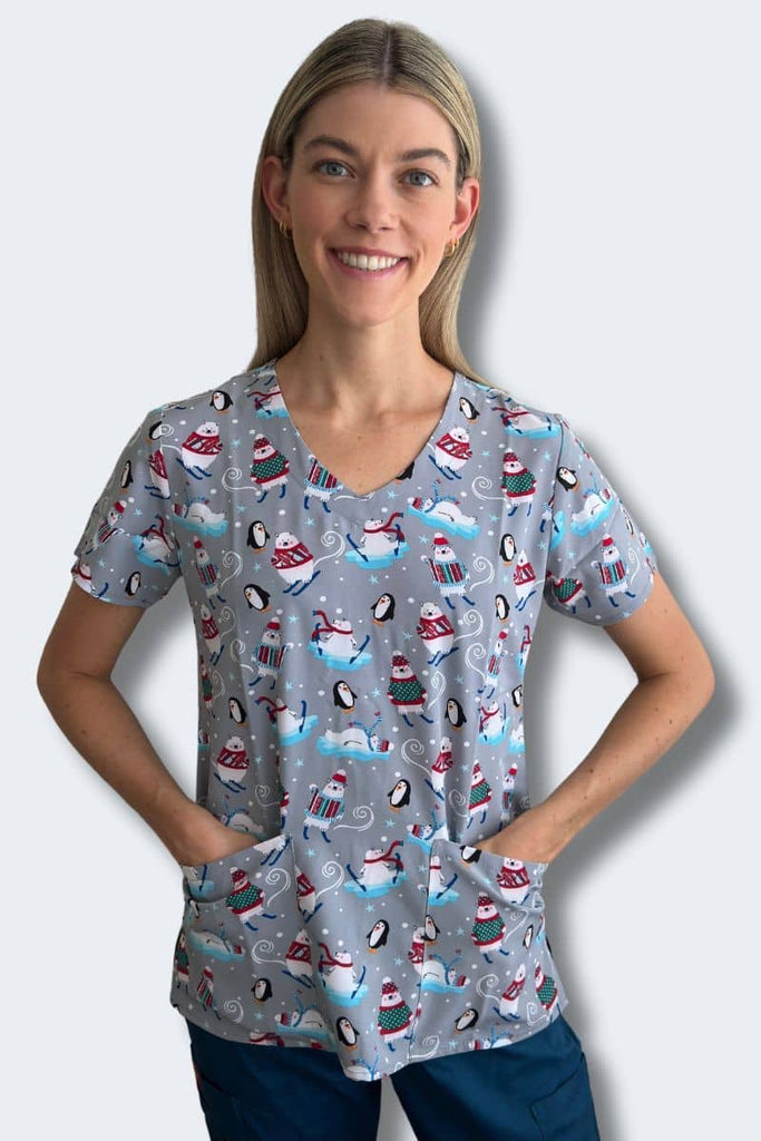 'Tis the Ski-son - Women's Christmas Scrub Top Model Front View | Infectious Clothing Company